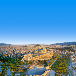 Uitzicht over Athene met de Akropolis en omliggende stad onder een heldere blauwe lucht.